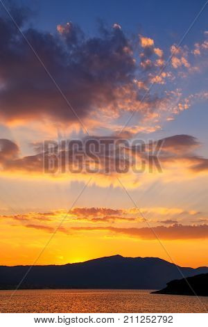 Sunrise over Peljesac Peninsula and Peljeski Strait seen from Korcula Croatia.