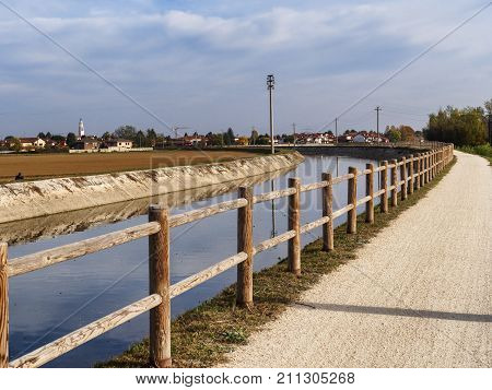 Bike path at Arconate (Milan Lombardy Italy) along the canal Villoresi at fall