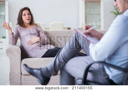 Pregnant woman visiting psychologist doctor
