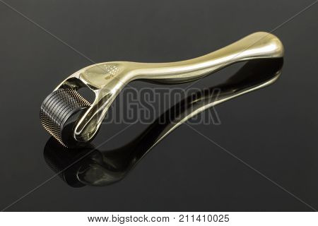 Derma roller for medical micro needling therapy. Tool also known as: Dermaroller, mesoroller, meso-roller, mesopen.