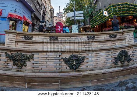 BELGRADE SERBIA - OCTOBER 21 2017: Public water fountain in historic and touristic bohemian quarter of Skadarlija.
