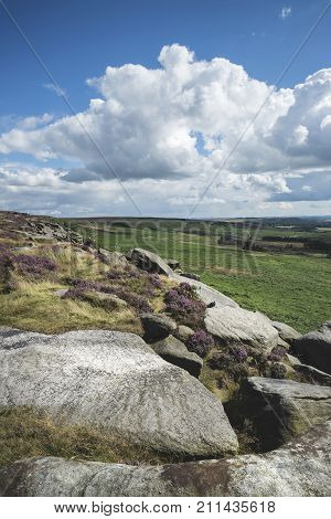 Beautiful Vibrant Landscape Image Of Burbage Edge And Rocks In Summer In Peak District England