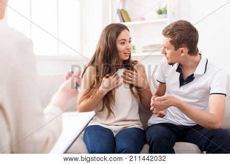Young couple conflict at therapy session. Relationship problems, family issues concept