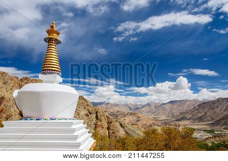 Buddhist stupa near Hemis monastery with dramatic sky, Leh Ladakh, India