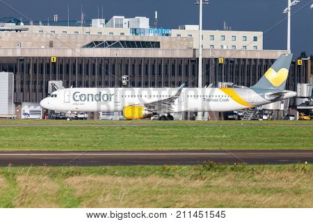 LANGENHAGEN / GERMANY - OCTOBER 28 2017: Airbus A 321 from airline Condor drives on airport to the runway.