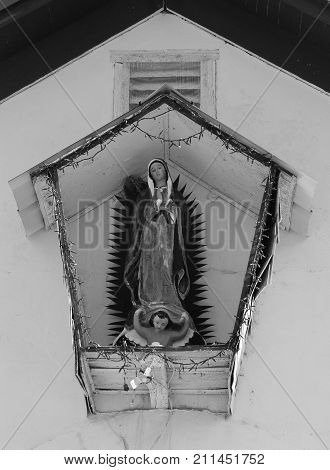 Guadalupe shrine on church exterior, Shafter, Texas