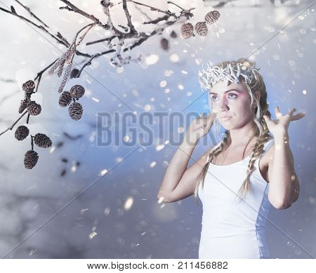 Fantasy winter queen from fairytale forest, ice makeup