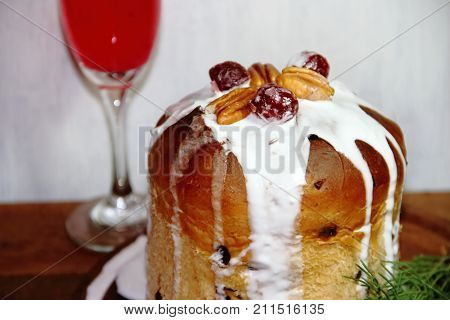 sweet bread Christmas pudding cin dried and glazed fruits and sparkling beverages