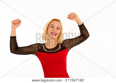Attrctive Young Blonde Woman Gesture Success With Arms Up Isolated Over White Background