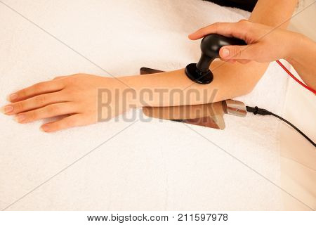 Physiotherapist Doing Tecar Therapy Alterantive Treatment On A Woman Patient