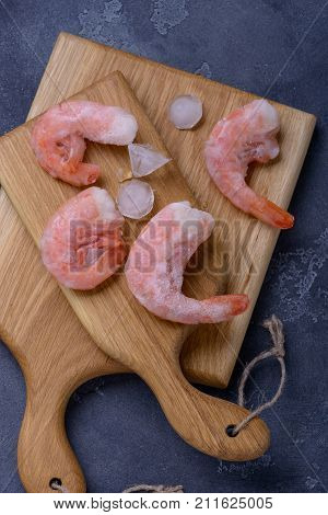Frozen Tiger Shrimp On Cutting Board
