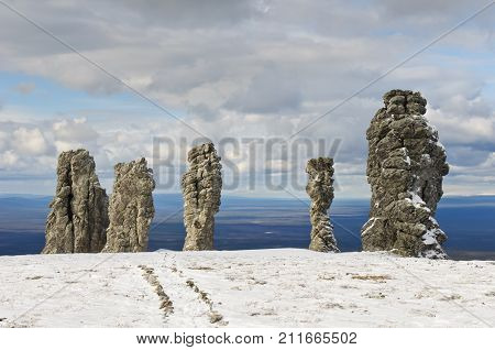 Manpupuner rock formations. Giant rocks at the Manpupuner Plateau, Northern Ural. One of the seven wonders of Russia