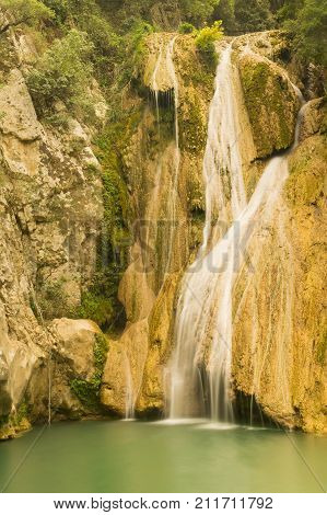 Famous touristic destination Kadi waterfall in polilimnio Greece.