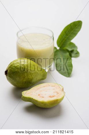 Guava  juice or Amrud drink or Smoothie with fresh Guava fruit, moody lighting selective focus