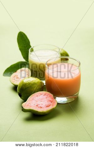 Guava  juice or Amrud drink or Smoothie with fresh Guava fruit, moody lighting selective focus