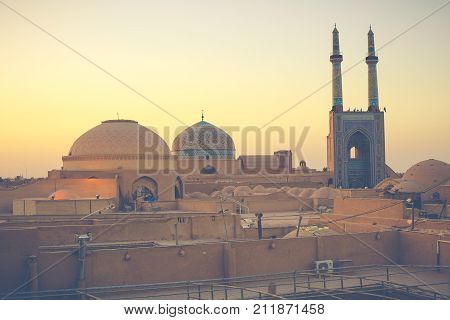 View Over The Old City Of Yazd, Iran And Masjed-i Jame' Mosque - Famous For Its Wind Towers.