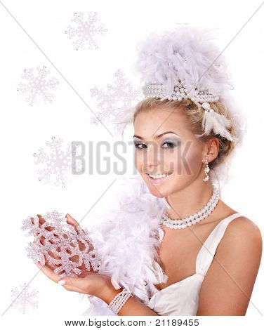 若い美しい女性持株スノーフレーク。スタジオ撮影をファッションします。