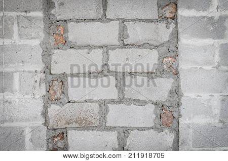 Bricked Up Door And Cinder Blocks Brick Wall Texture. Abandoned House Exterior.