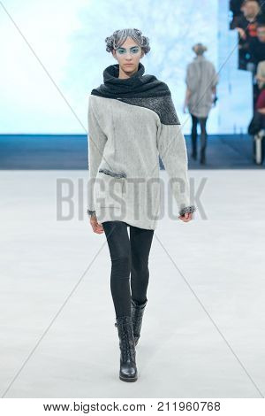 ZAGREB, CROATIA - OCTOBER 28, 2017: Fashion model wearing clothes designed by Marina Design and acessories designed by Marija Ivankovic at the 'Fashion.hr' fashion show