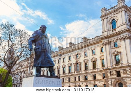 London, Uk - May 13 2018: Statue Of Winston Churchill At The Parliament Square With Other Twelve Sta