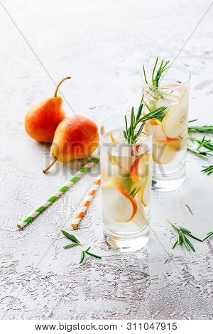 Summer Drinks, Rosemary Pear Cocktails With Ice In Glasses. Refreshing Summer Homemade Alcoholic Or 