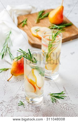 Summer Drinks, Rosemary Pear Cocktails With Ice In Glasses. Refreshing Summer Homemade Alcoholic Or 