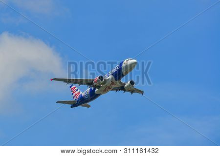 Airplane Taking-off From The Airport