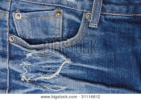 Staré džíny perforované detail