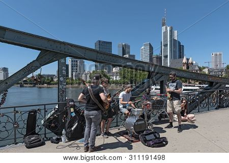 Performance Of Street Musicians On The Eiserner Steg In Frankfurt Am Main Germany