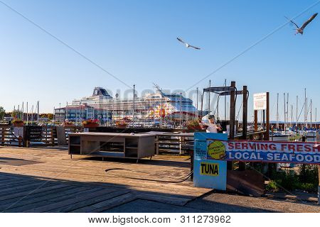 Astoria, Oregon - October 03 2017: Norwegian (ncl) Sun Docked On The Columbia River At Port Of Astor