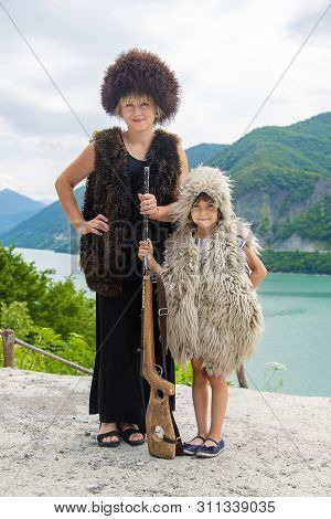 A Child In The Georgian Costume. Selective Focus.