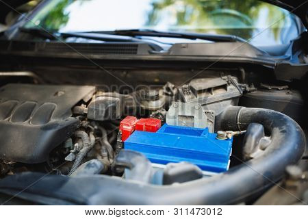 new lead-acid automotive electric battery replacement in old car