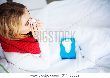 Flu And Sick Woman. Sick Woman Using Paper Tissue, Head Cold Problem