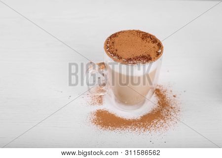 Close Up Of Latte Cinnamon Sprinkle On White Background