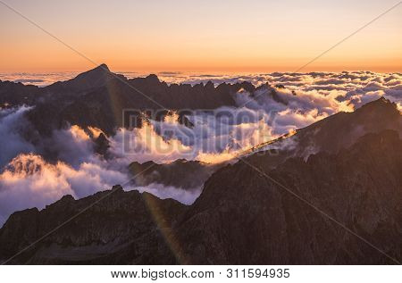 Mountains Landscape With Inversion In The Valley At Sunset As Seen From Rysy Peak In High Tatras, Sl