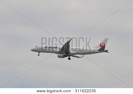 Passenger Airplane Landing At The Itami Airport