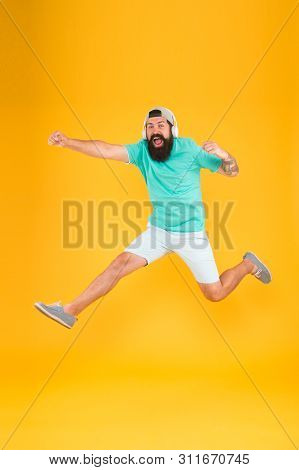 Energy Of Rhythm. Music Library. Music Fan. Man Listen Music Wireless Headphones In Motion. Bearded 