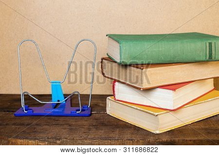 Bookend And Book On A Wooden Table