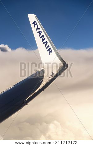 Memmingen, Germany - July 6 2019: Ryanair Irish Low-cost Airline Boeing 737 Wing During Flight With