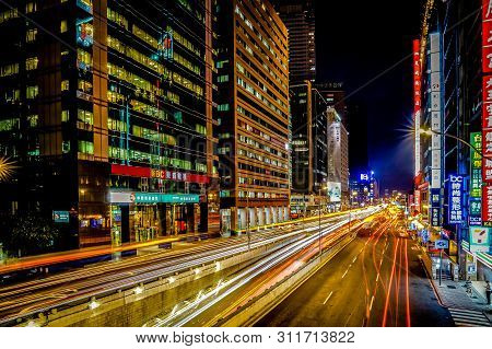 Taipei, Taiwan - 2 Oct, 2017: Taipei Main Road In The Twilight Time With Building And Lightbow Envir