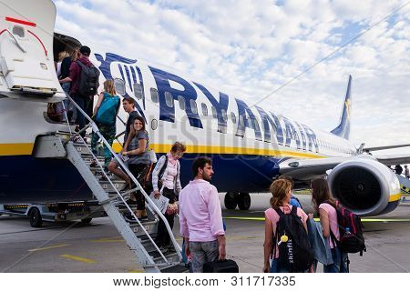 Memmingen, Germany - July 6 2019: People Boarding Ryanair Irish Low-cost Airline Plane Boeing 737 Wi