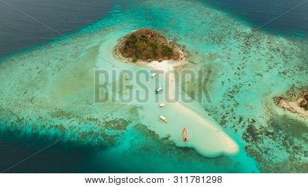 Aerial Seascape Tropical Island And Sand Beach, Turquoise Water And Coral Reef. Malacory Island, Phi