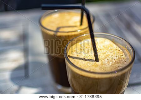 Traditional Greek Cold Coffee Frappe Made From Water, Instant Coffee And Ice Cubes
