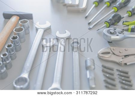 Beautifully Placed On Desk Hand Tools, Such As: Hammer, Screwdriver, Combination Wrenches, Hexagonal