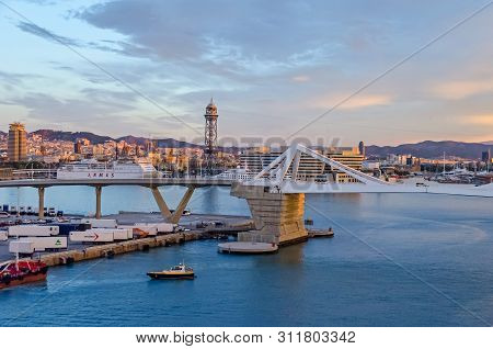 Barcelona, Spain - November 10, 2018: Port Vell With Its Bascule Bridge Porta Deuropa, Containers Of