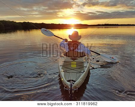 Everglades National Park, Florida 02-05-2017 Active Senior Kayaks On An Exceptionally Calm Coot Bay 