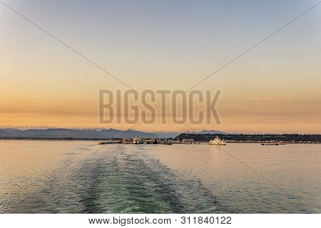 Delta, Canada - July 12, 2019: Bcferries Boat In Open Water Near Tsawwassen Ferry Terminal Sunset Ri