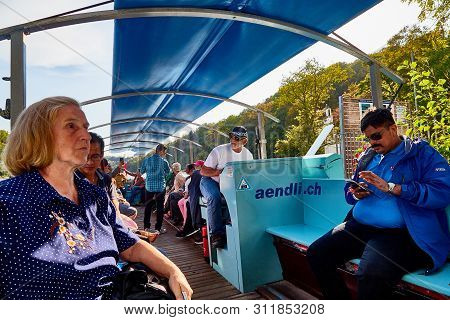 Rhine, Switzerland - September 19, 2018: Tourists Sitting In The Boat On The River Rhine Near The Rh