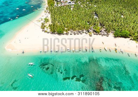 Beautiful Tropical Island In Sunny Weather, View From Above. Daco Island, Philippines. White Sandy B