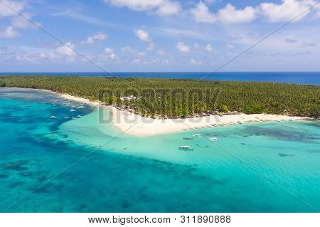 Seascape With A Beautiful Island. Daco Island, Philippines. Tropical Island With A White Sandy Beach